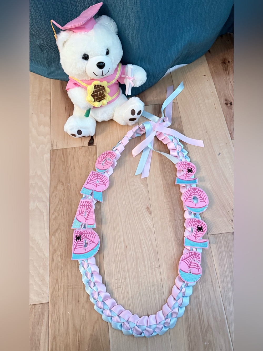 Pink & Light Blue Braided Letter Lei with Spider Web Appliqués, graduation 2026